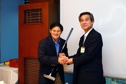 Mr. Endo, Managing Director shake hands with Armin Santos (left) of the Philippine Retirement Authority.