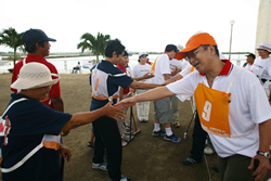 After game Japanese association team (right) shake hands with Philippine team.