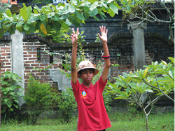 The high school student trained as referee , judges the game.