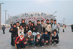 Taking a picture in the front of "Bird's nest" that became the Beijing Olympics opening ceremony stadium